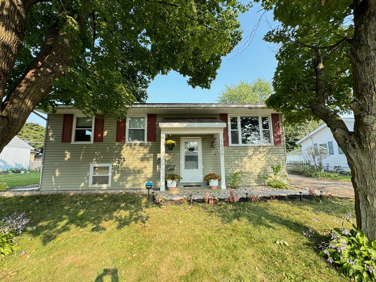 front view of a house with a yard