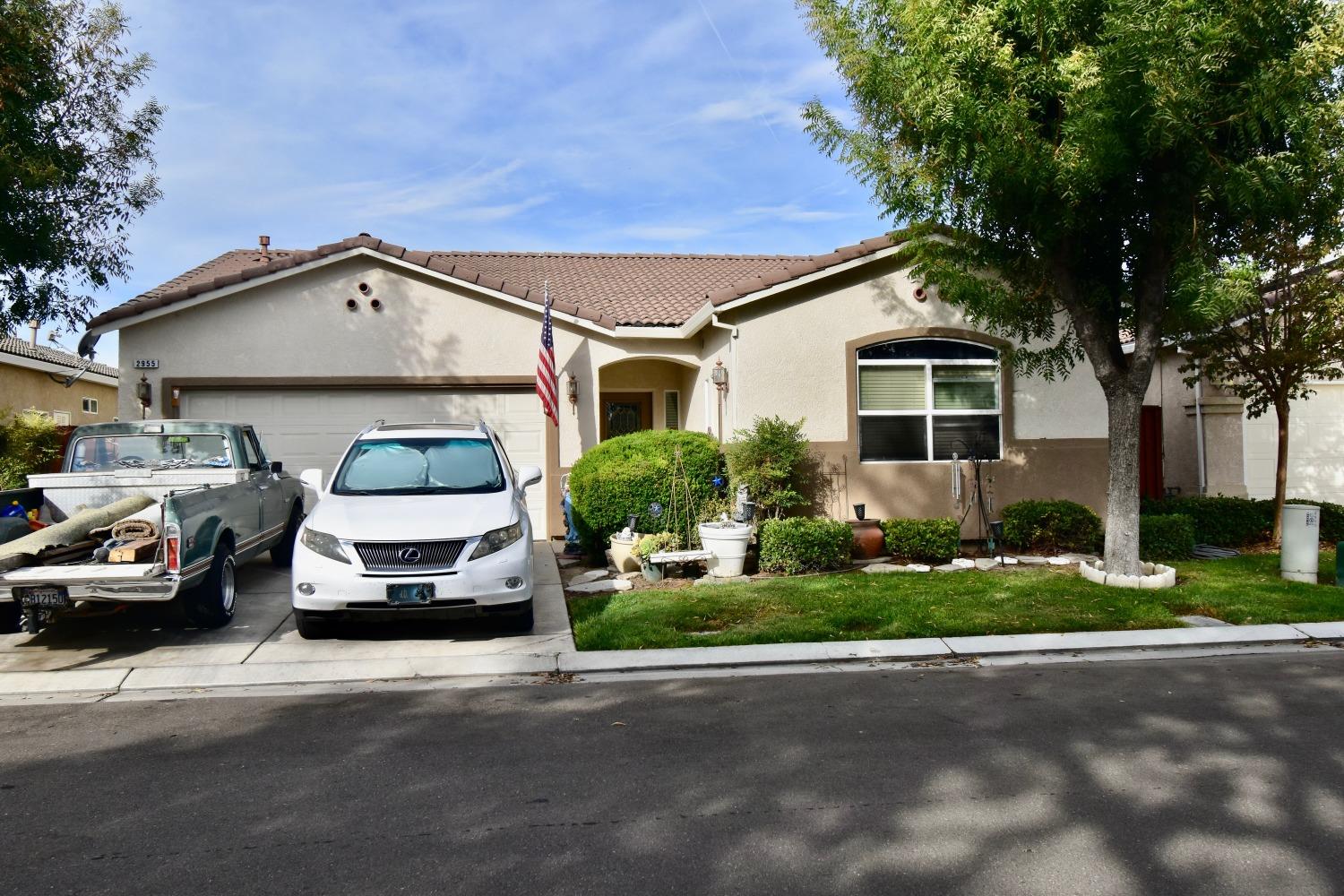 a car parked in front of a house