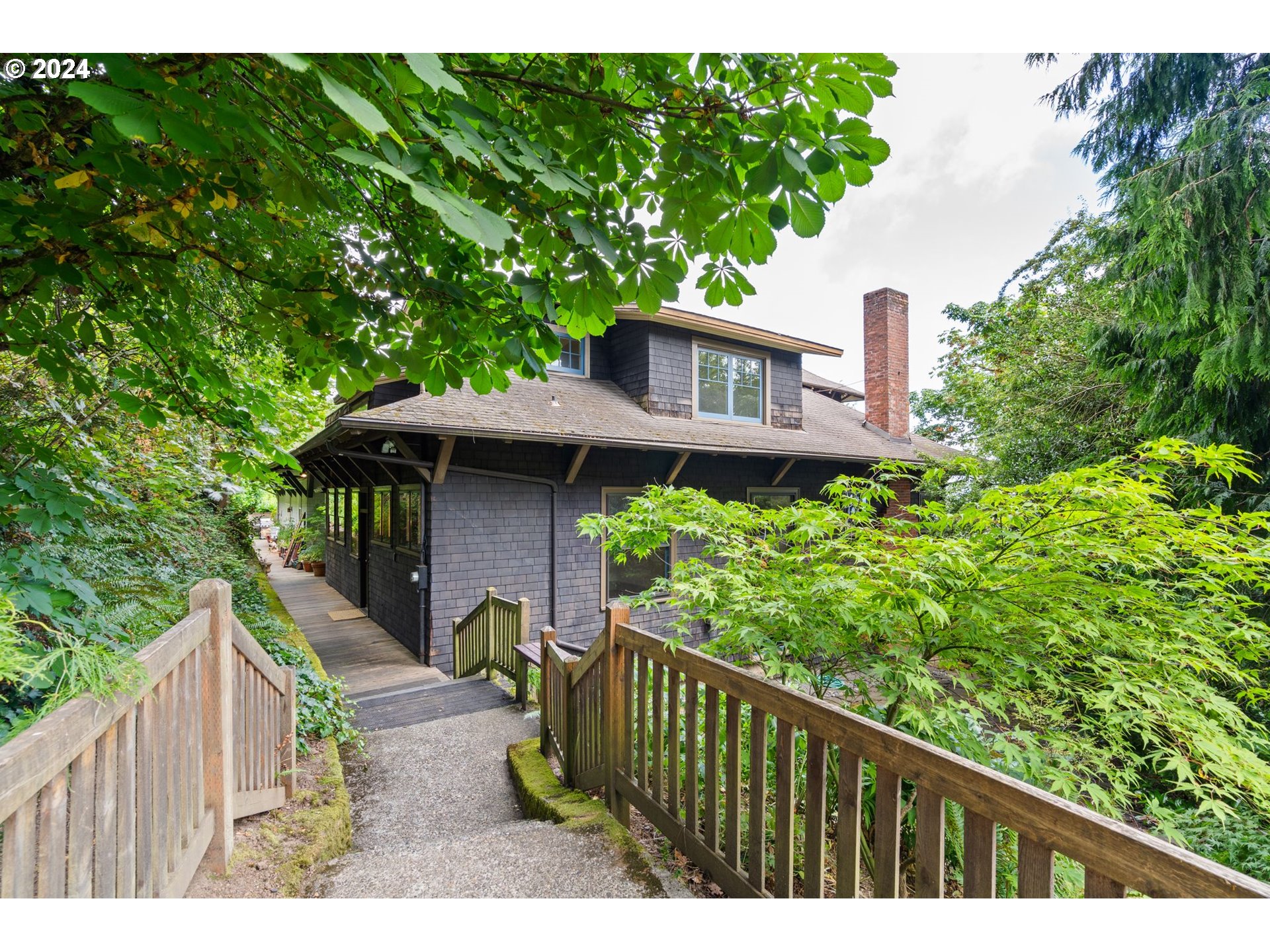 a house view with a garden space