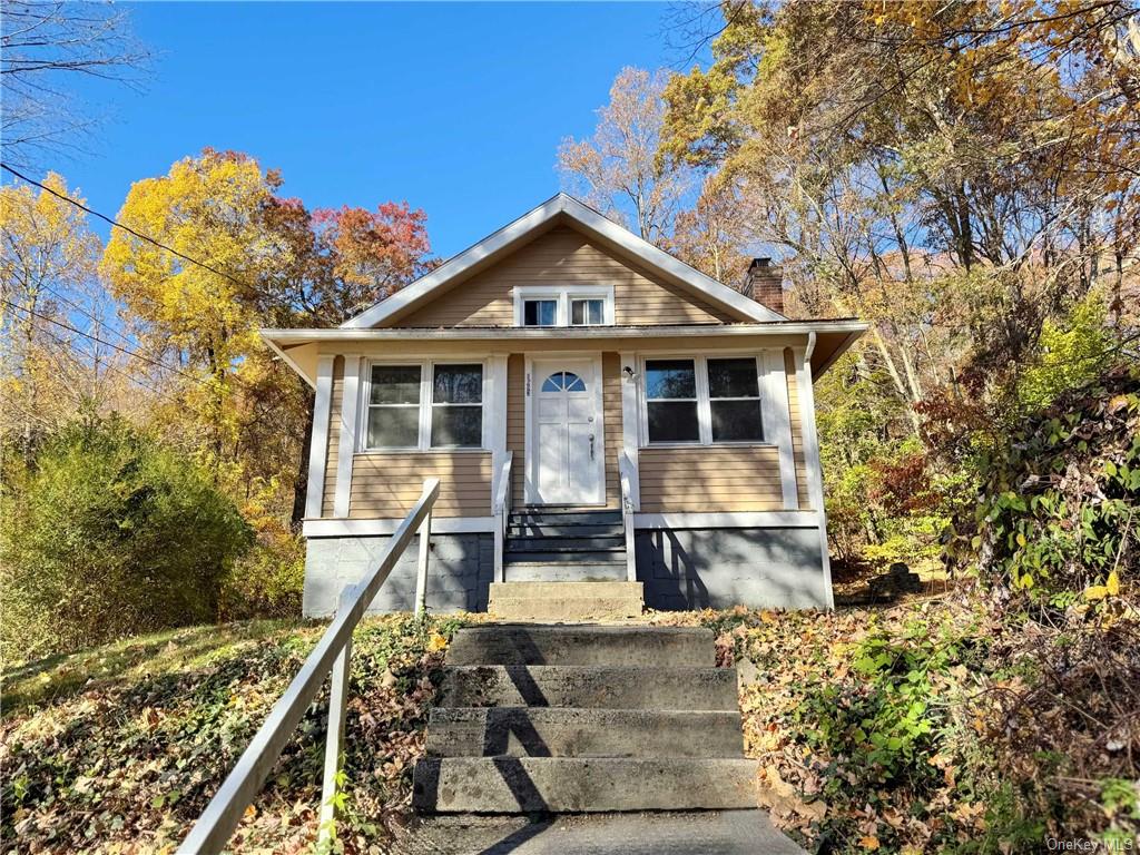 front view of house with a yard