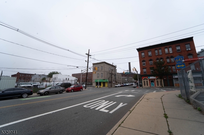 a view of a street with cars