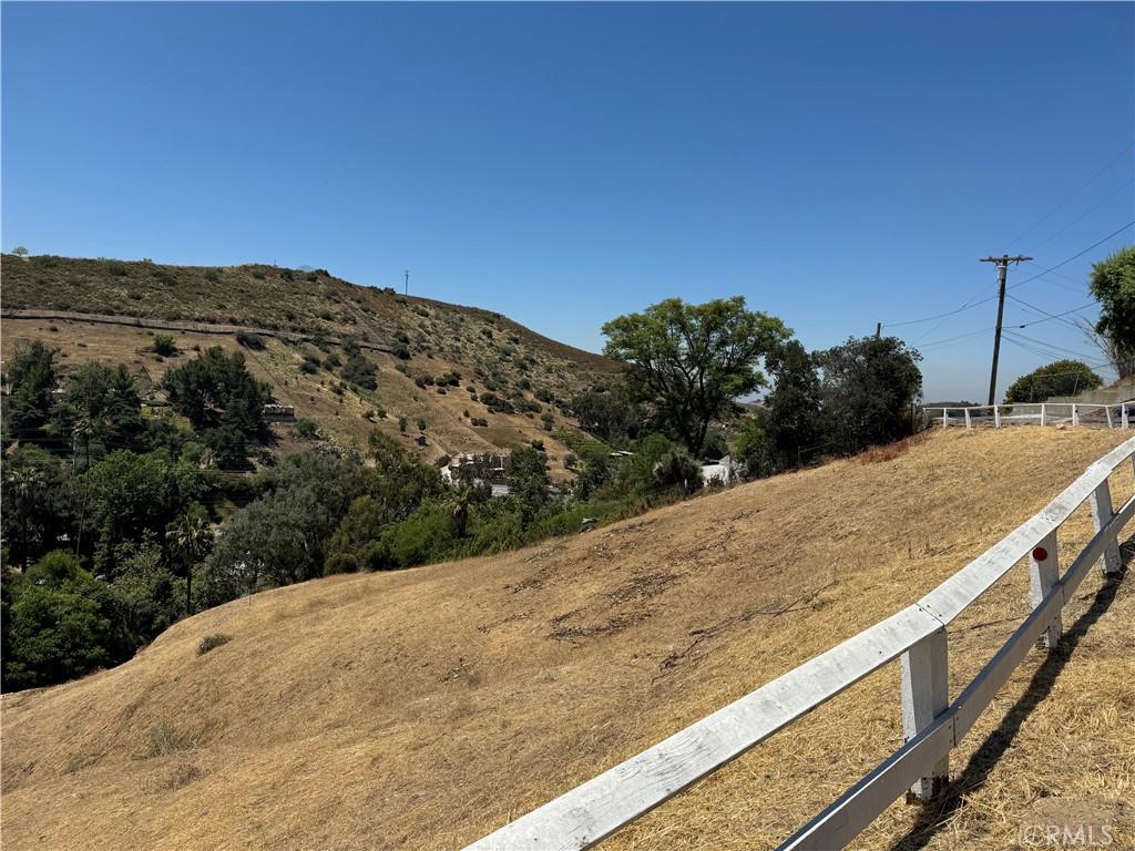 a view of a dry yard with mountain