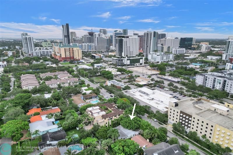 a view of a city with tall buildings