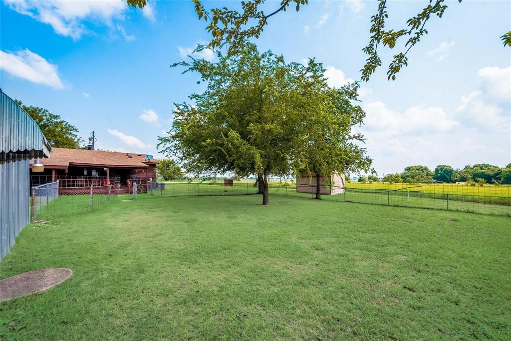 a view of a house with a big yard