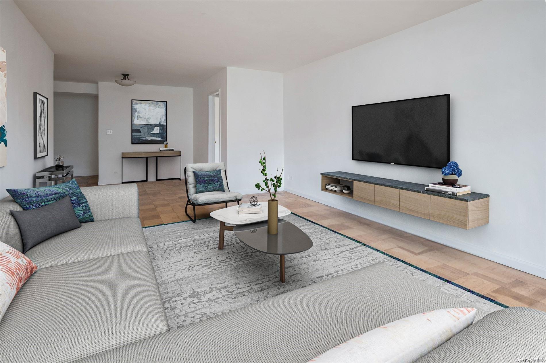 a living room with furniture and a flat screen tv