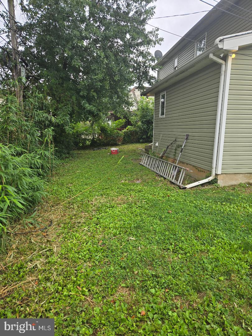 a view of a backyard with a garden