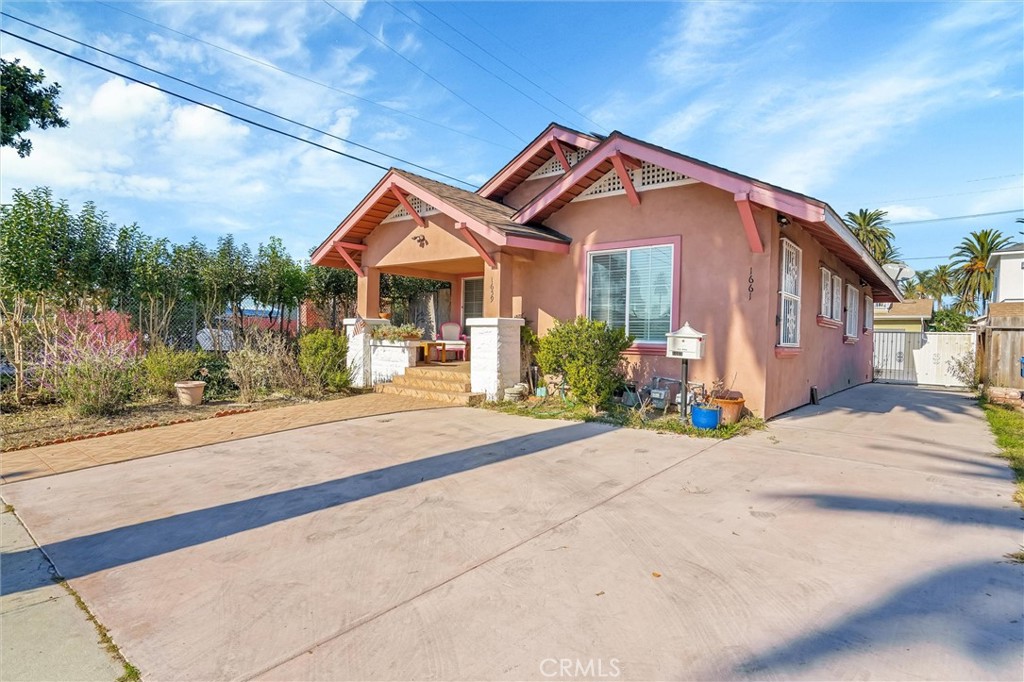 a front view of a house with yard