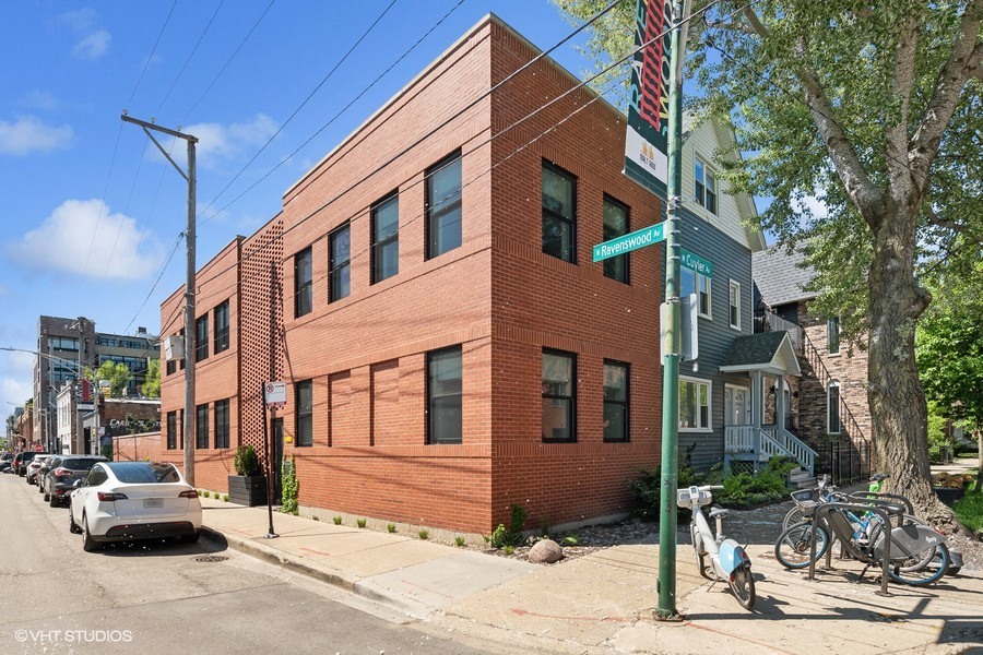 a front view of a building with street view