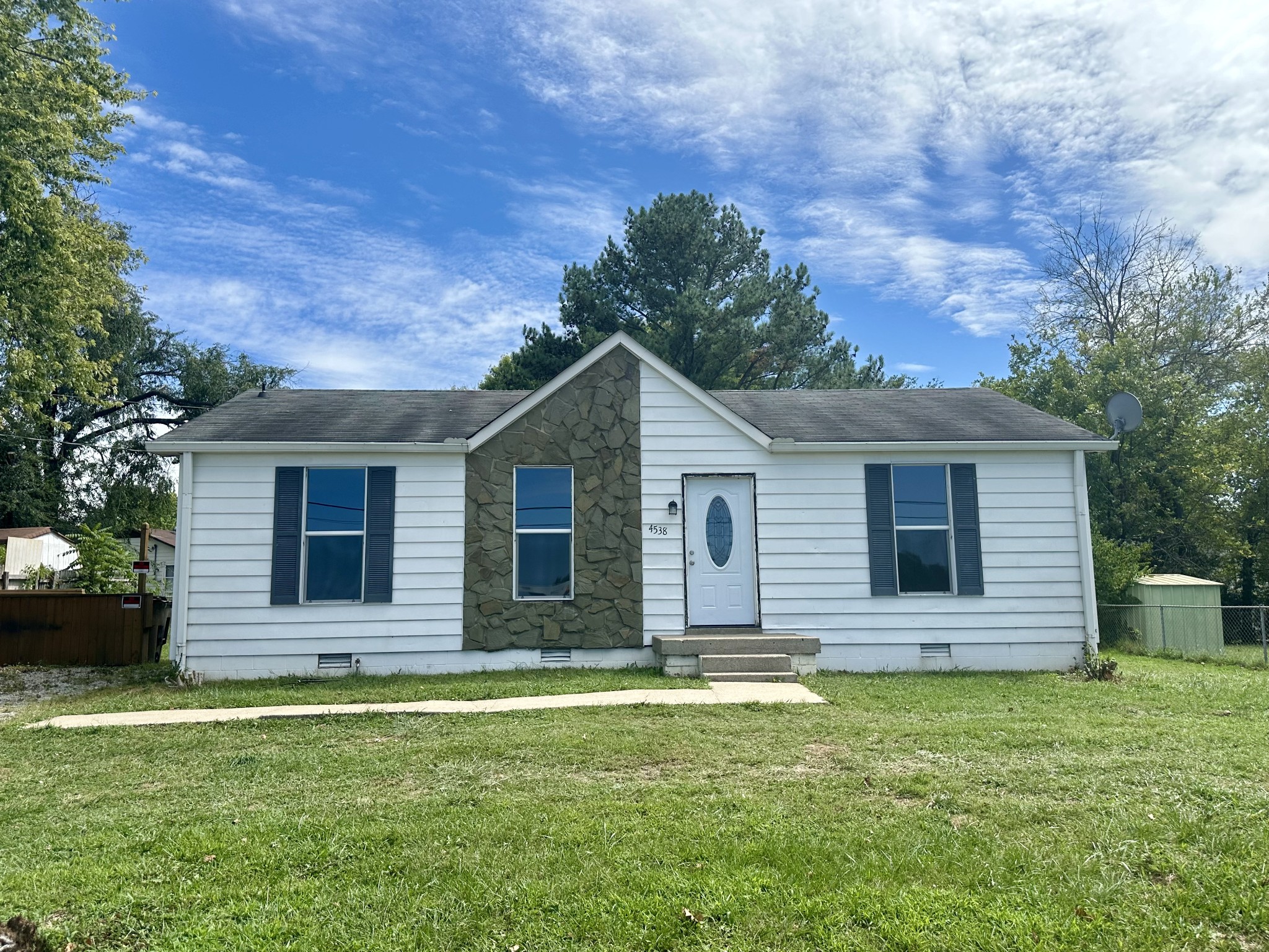 a front view of house with yard