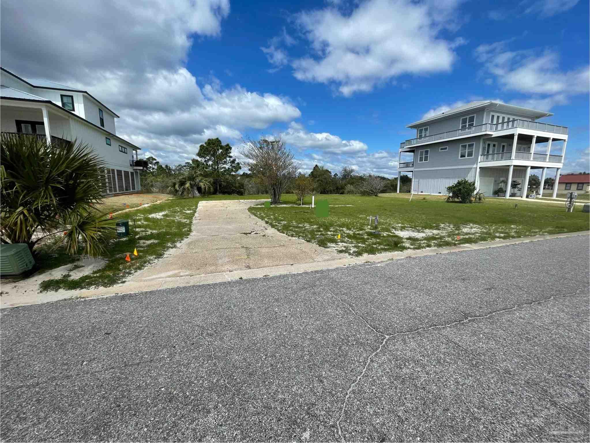 a view of house with yard