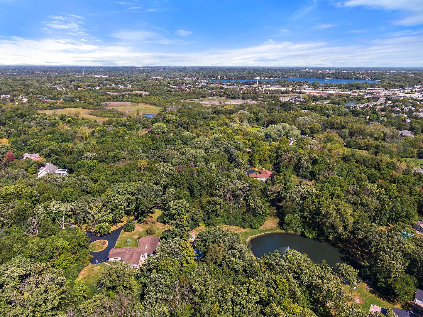 an aerial view of a city with lots of residential buildings