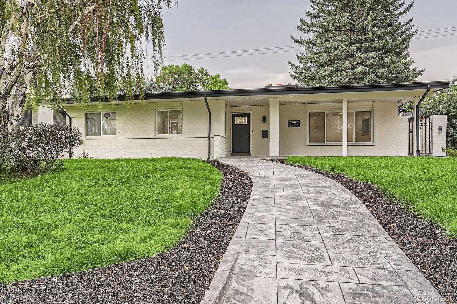 front view of a house with a yard