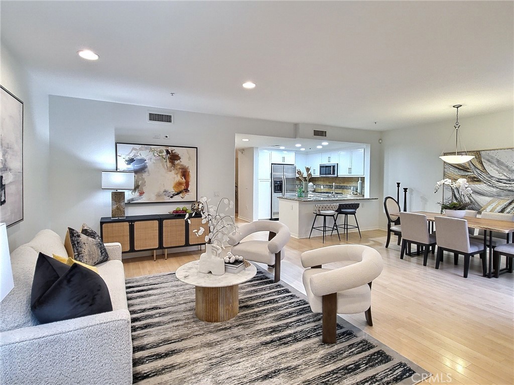 a living room with furniture and a table