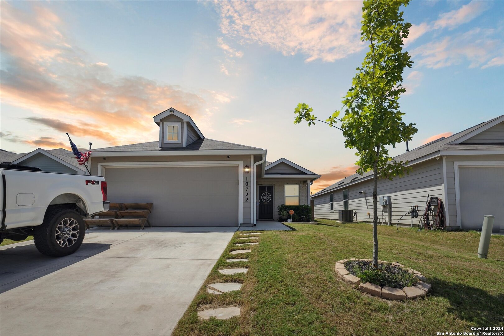 a house view with a garden space