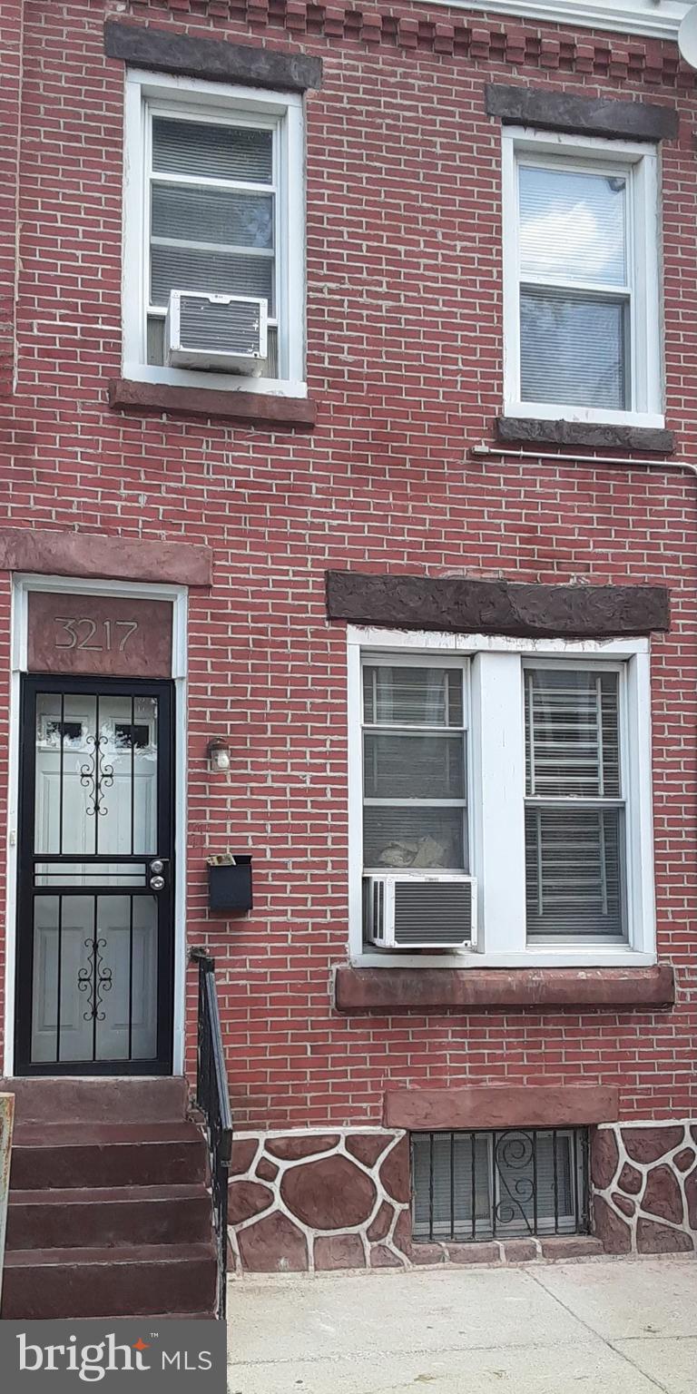 a front view of a house with a window