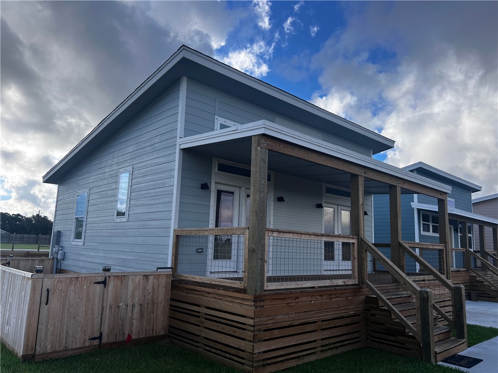 a front view of a house with a stairs