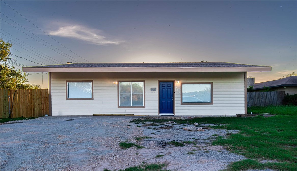 a front view of house with yard