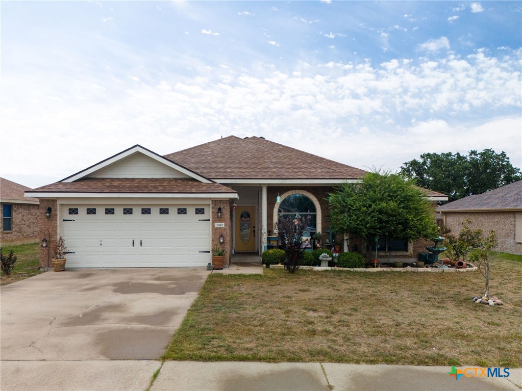 front view of house with a yard