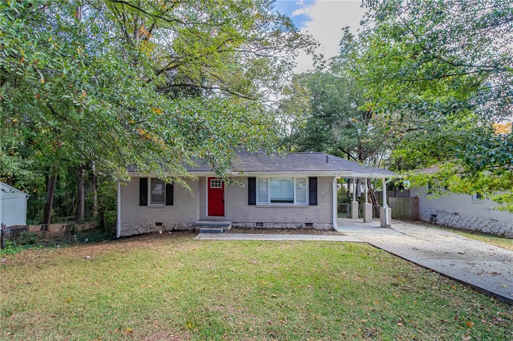 front view of a house with a yard