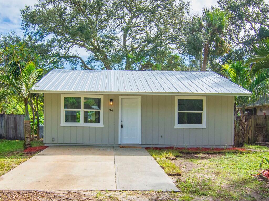 front view of house with a yard