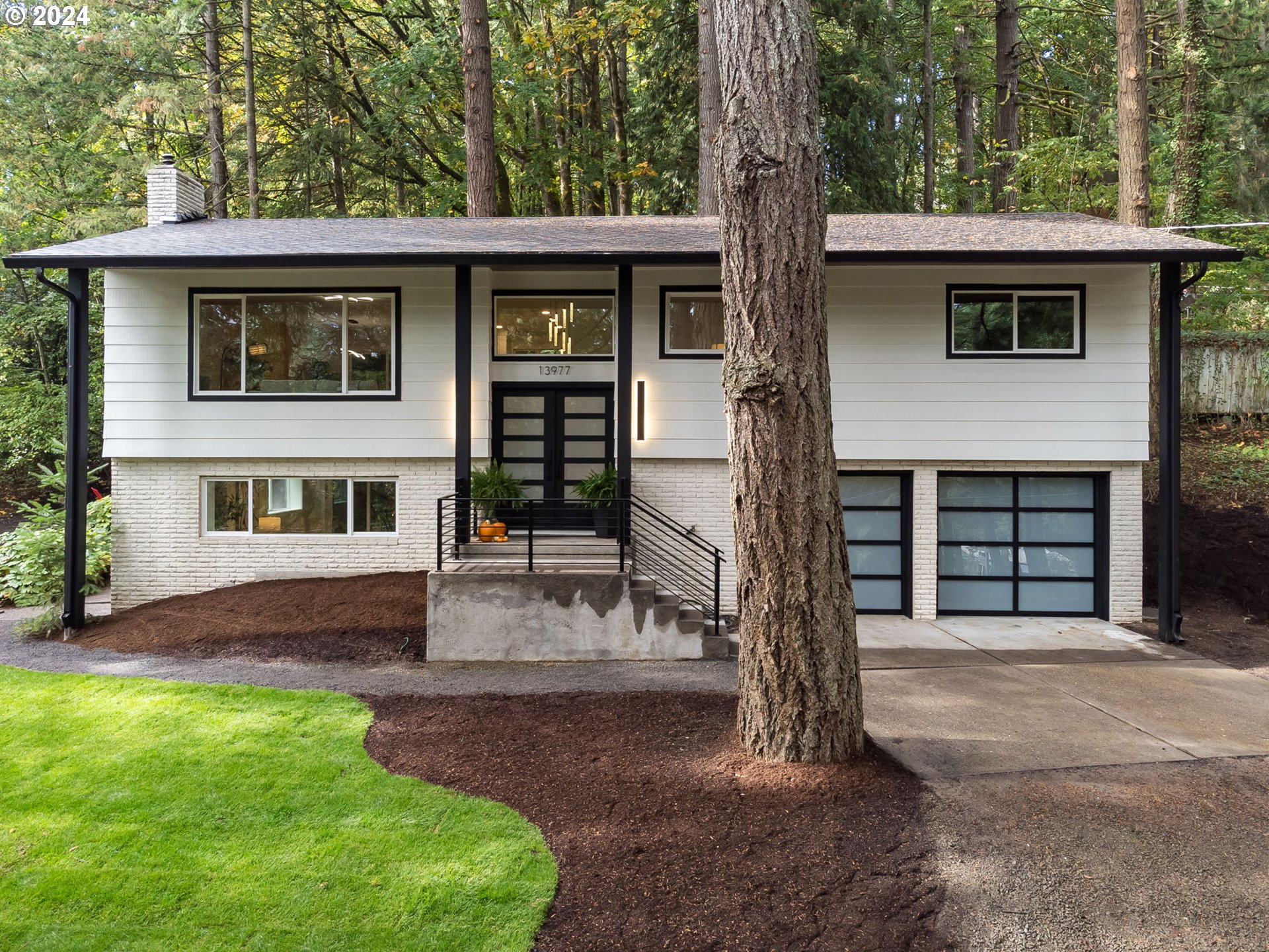 a view of a house with a yard