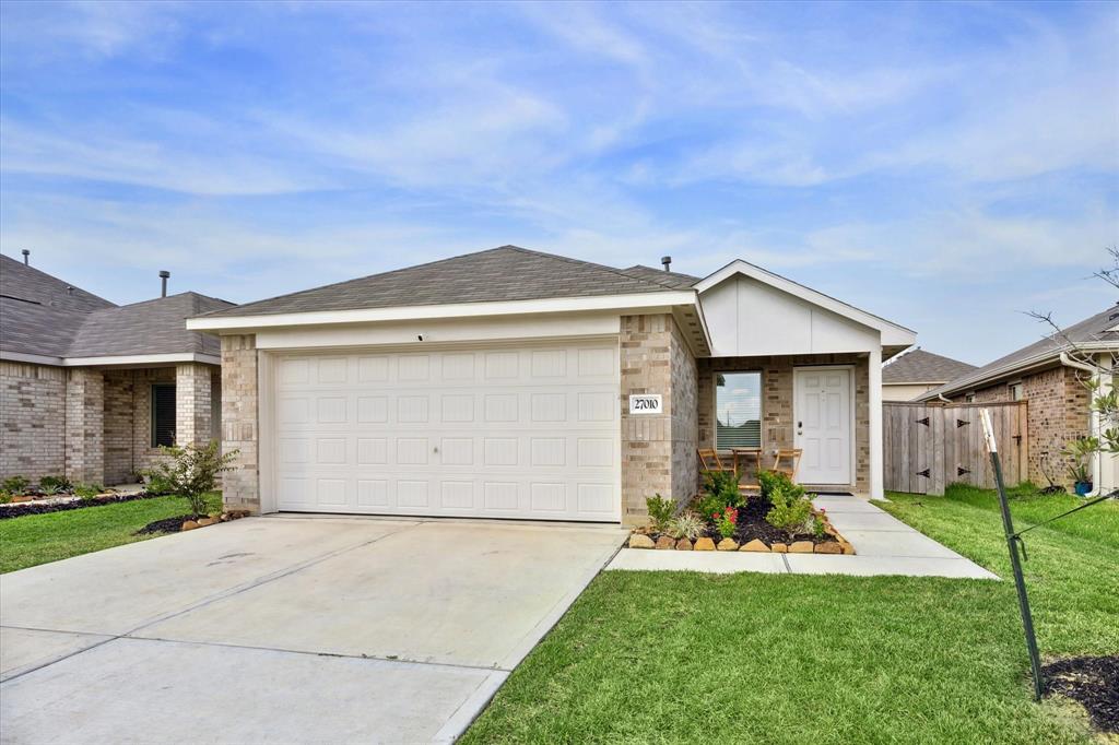 front view of house with a yard