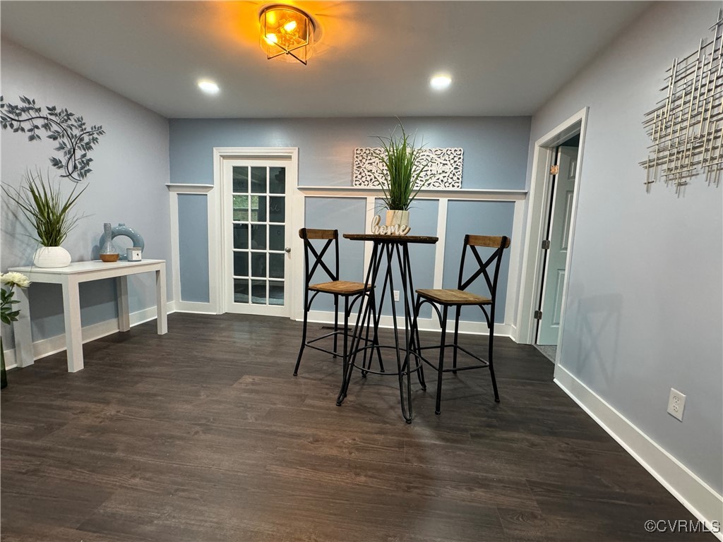 a view of a livingroom with furniture and wooden floor