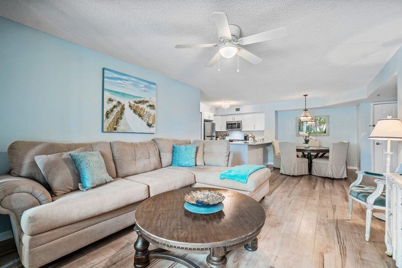 a living room with furniture and a table