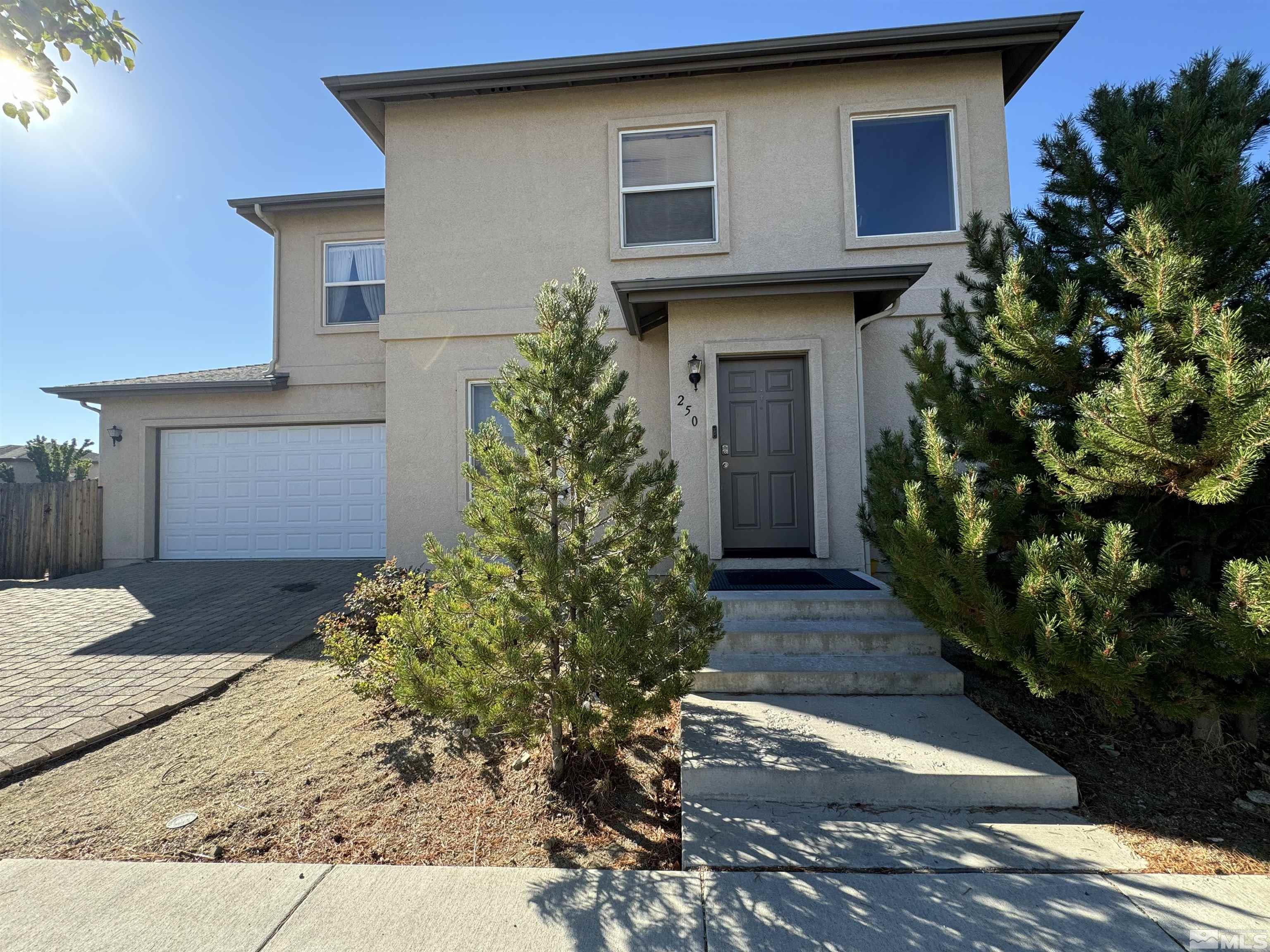 a house with trees in front of it