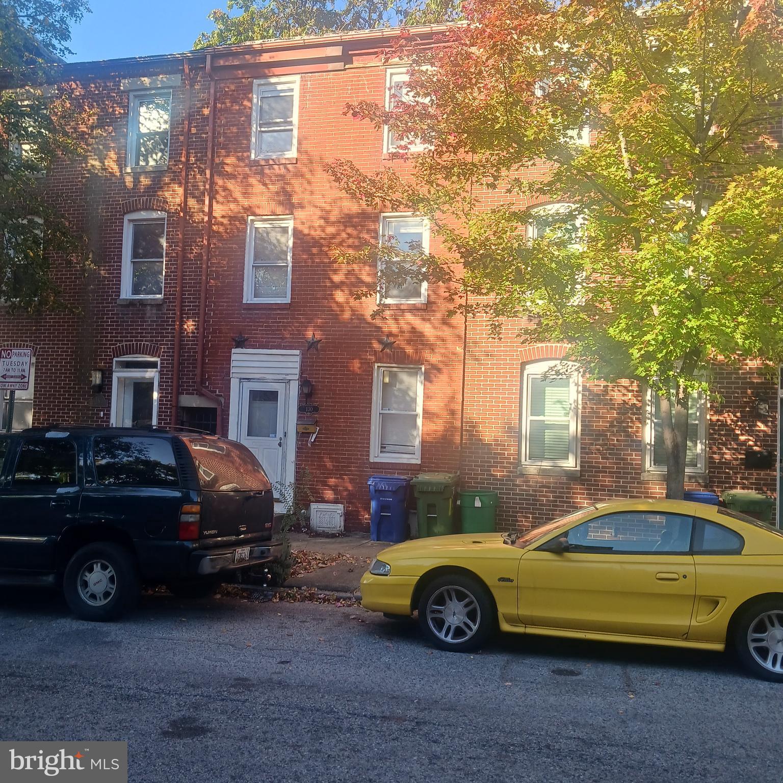 a car parked in front of a house