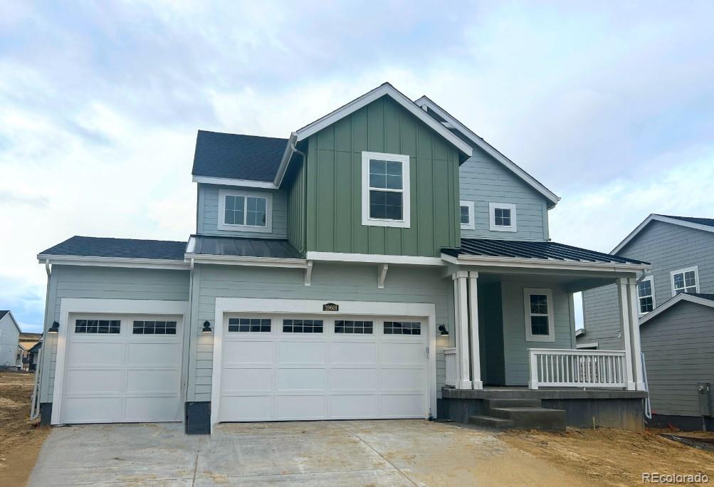 a front view of a house with a garage