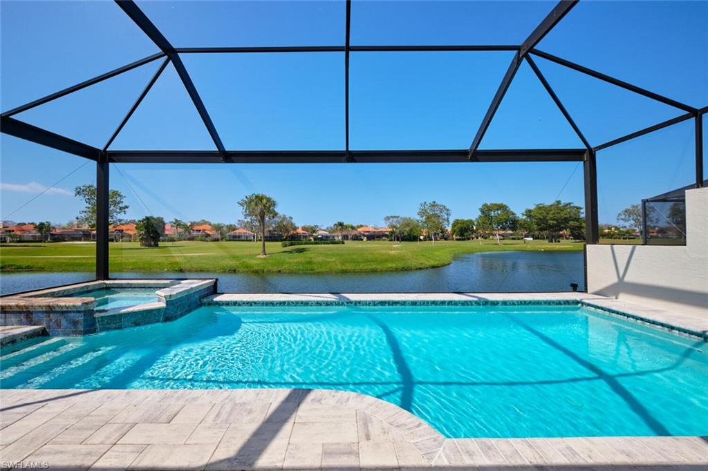 South/West Views: Salt water swimming pool with an in ground hot tub and Open Screen Enclosure.  Also, Lake and Golf Course views.  Beautiful Sunset Views.