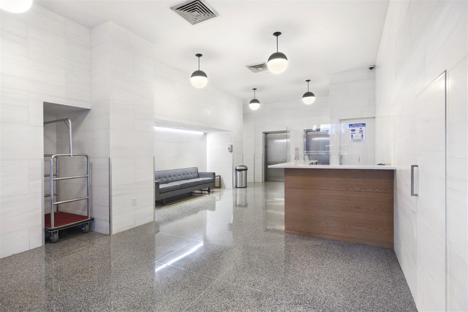 a view of a kitchen with a sink and dishwasher