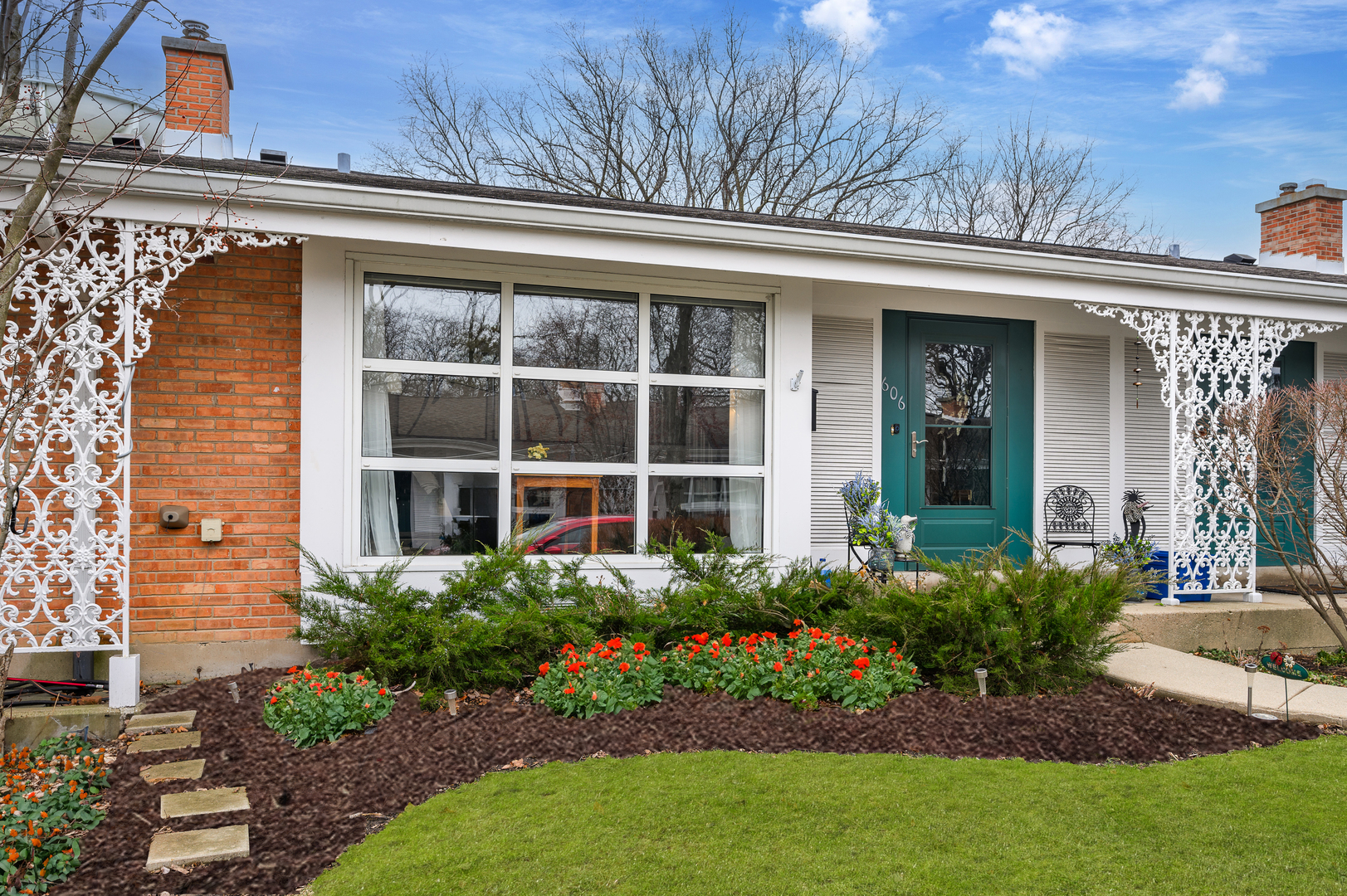 front view of a house with a yard