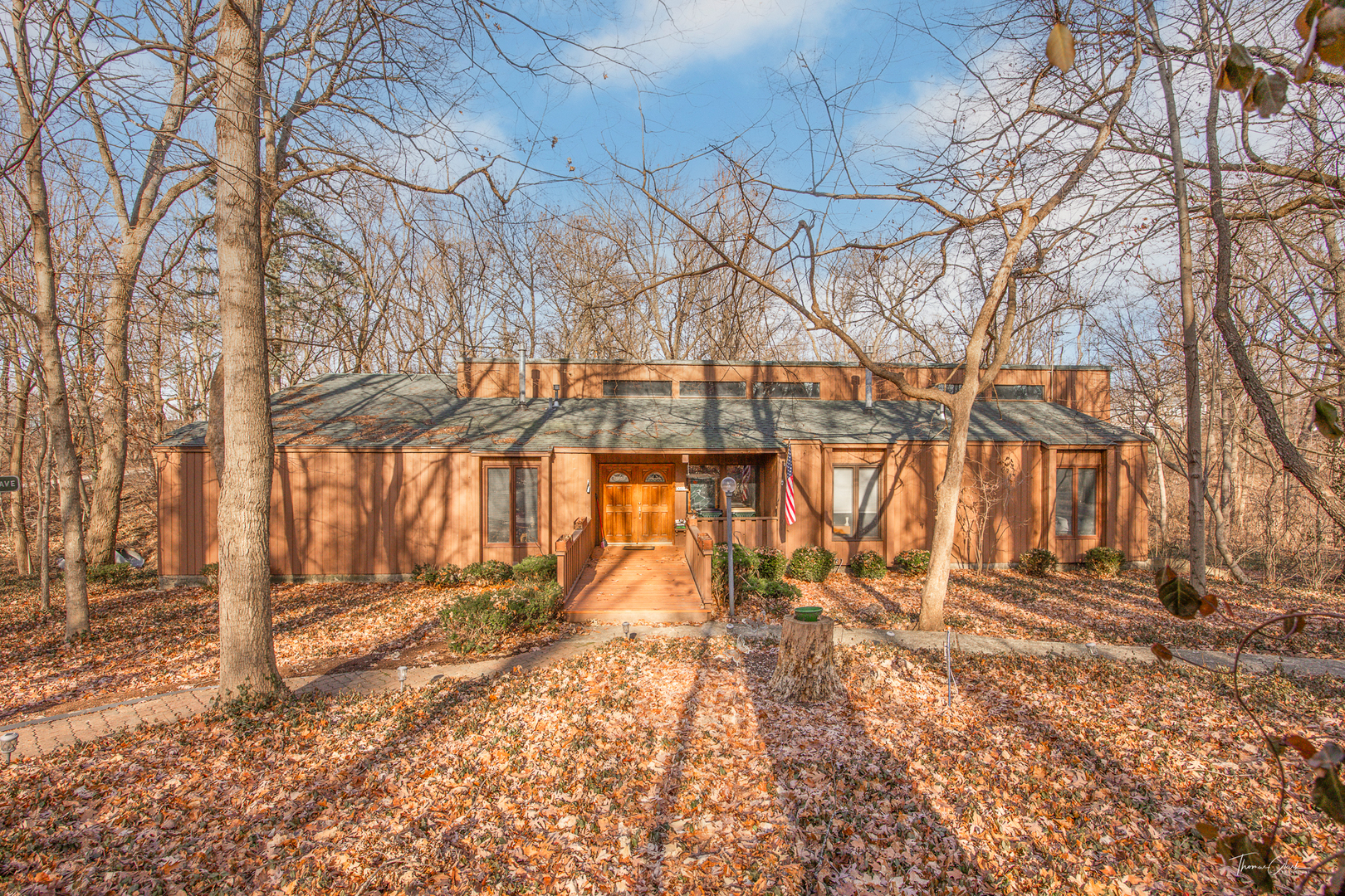 a backyard of a house with a trees