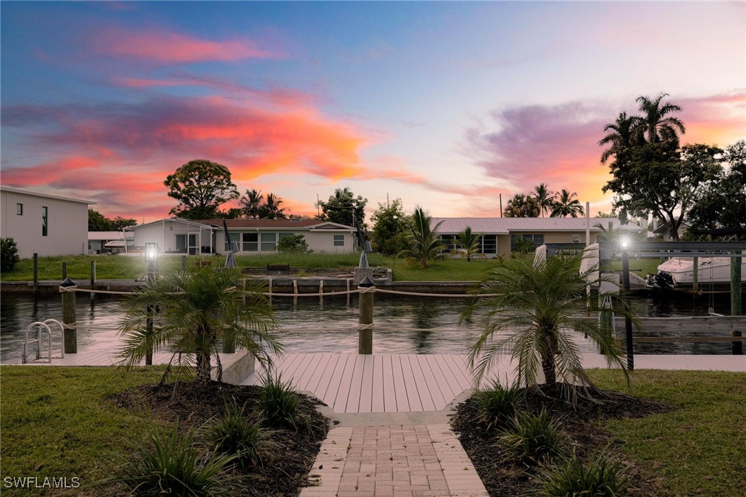 a lake view with a garden