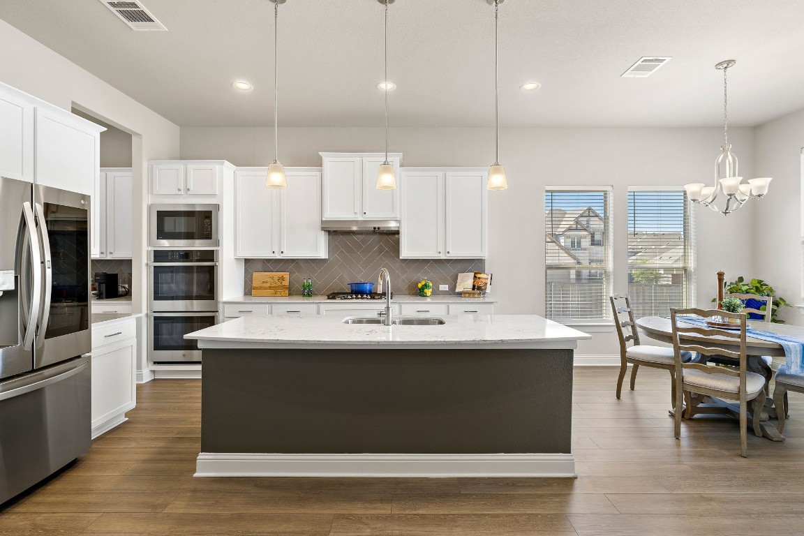 a view of kitchen and kitchen island