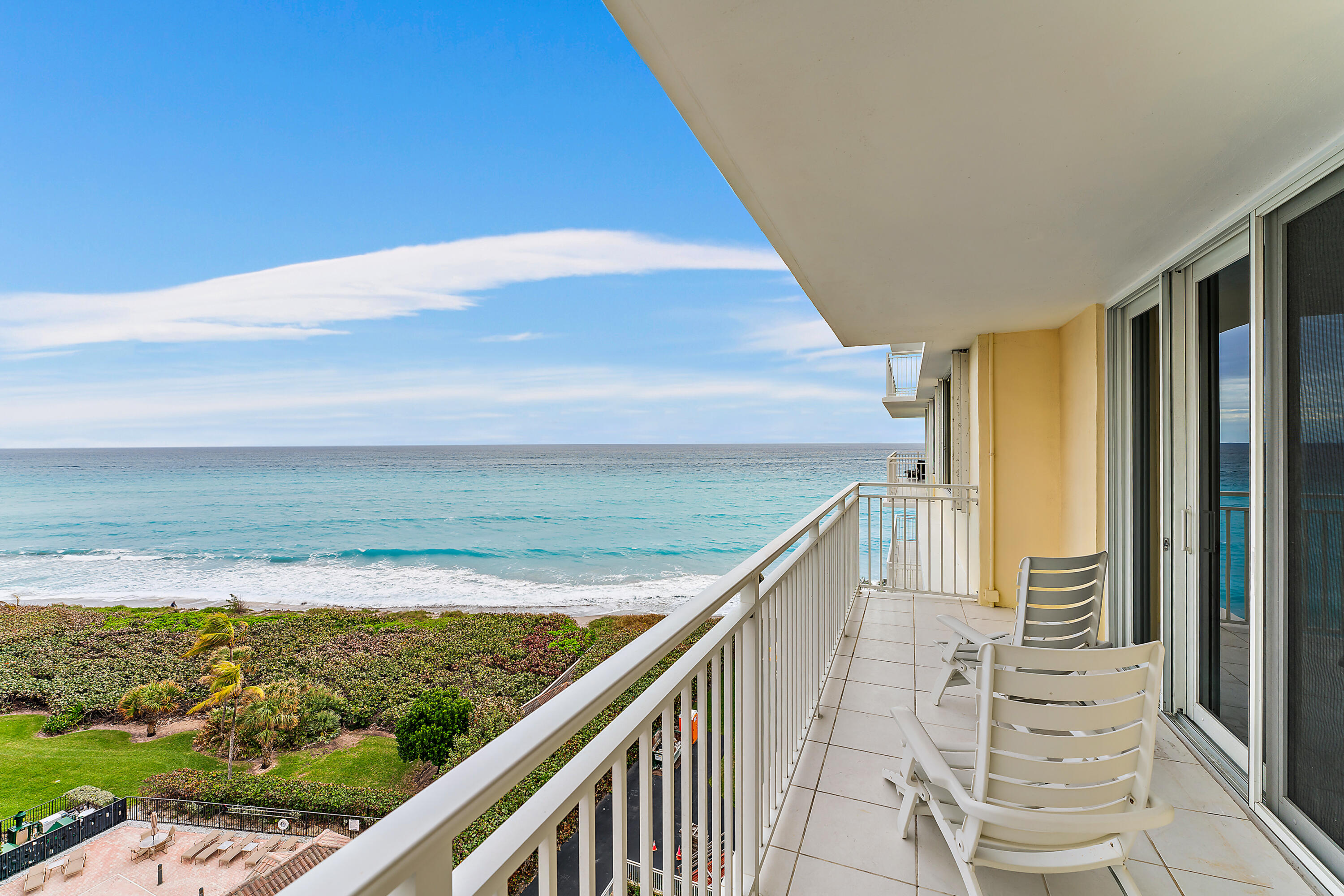 a view of ocean from a balcony