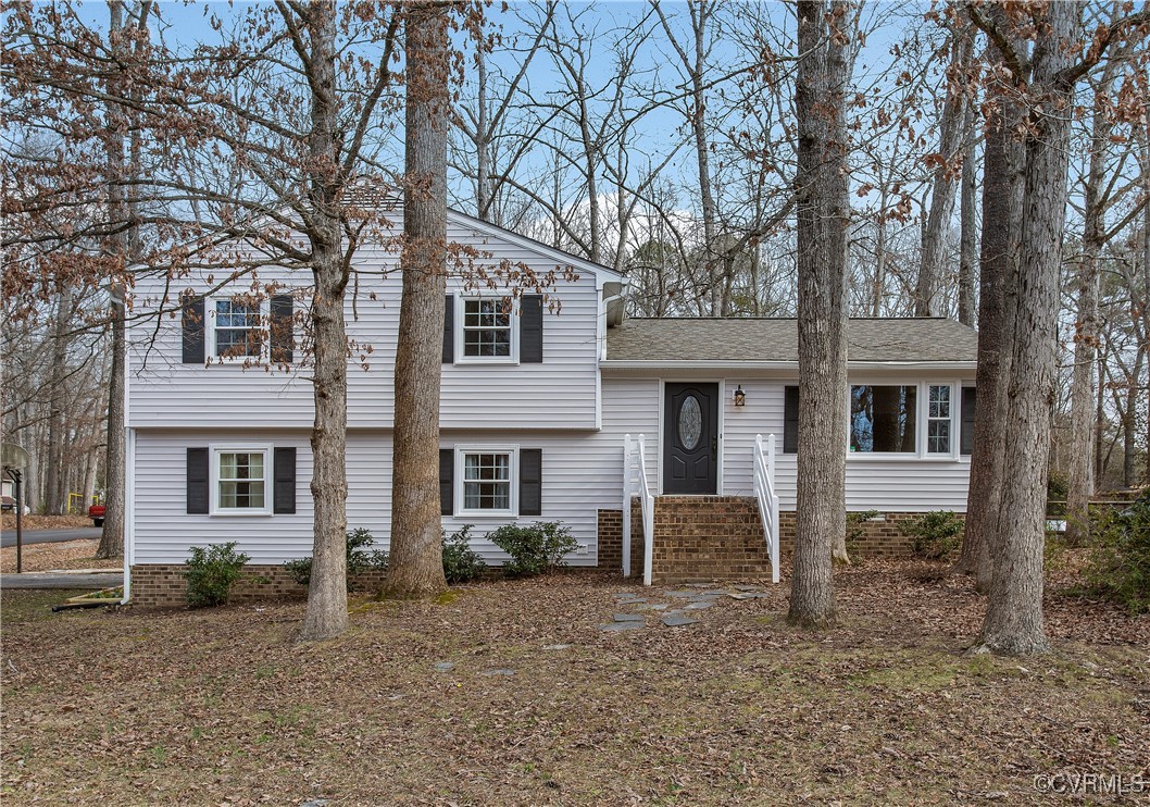 front view of a house with a yard