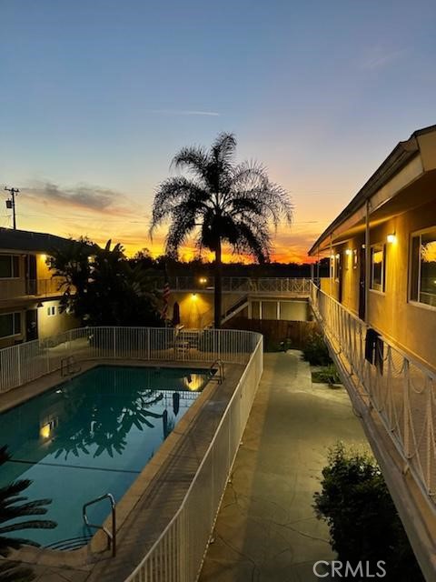 a view of a swimming pool with a lounge chairs