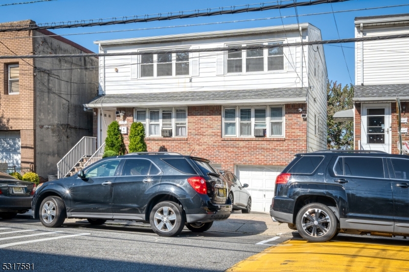 a car parked in front of a house