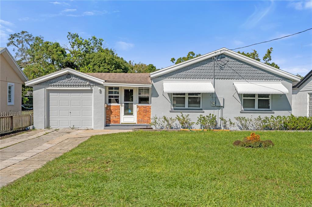 front view of a house and a yard