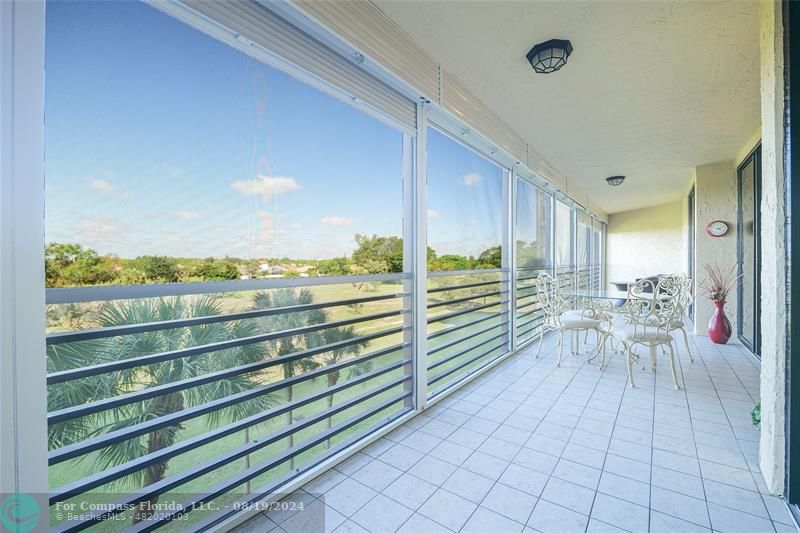 a view of outdoor space with seating area