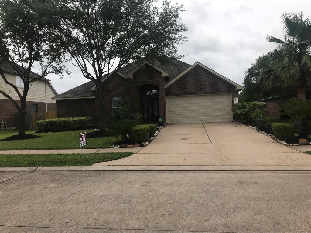 a house with trees in the background