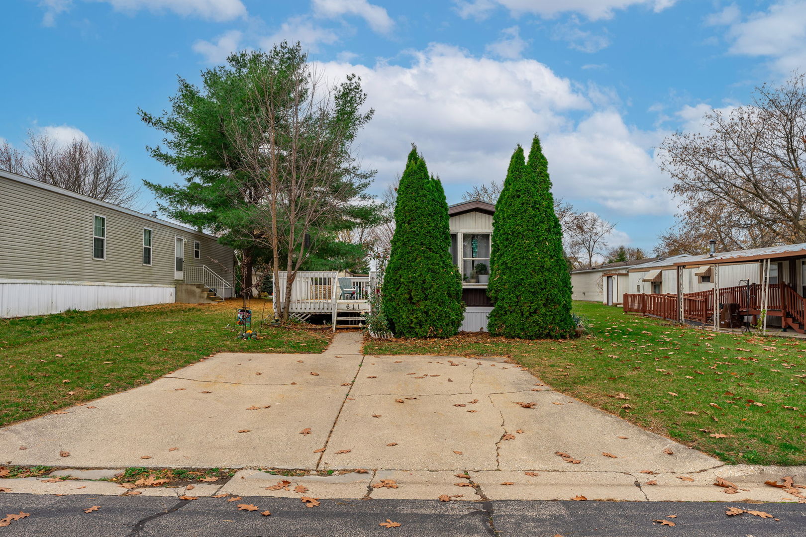 front view of a house with a yard