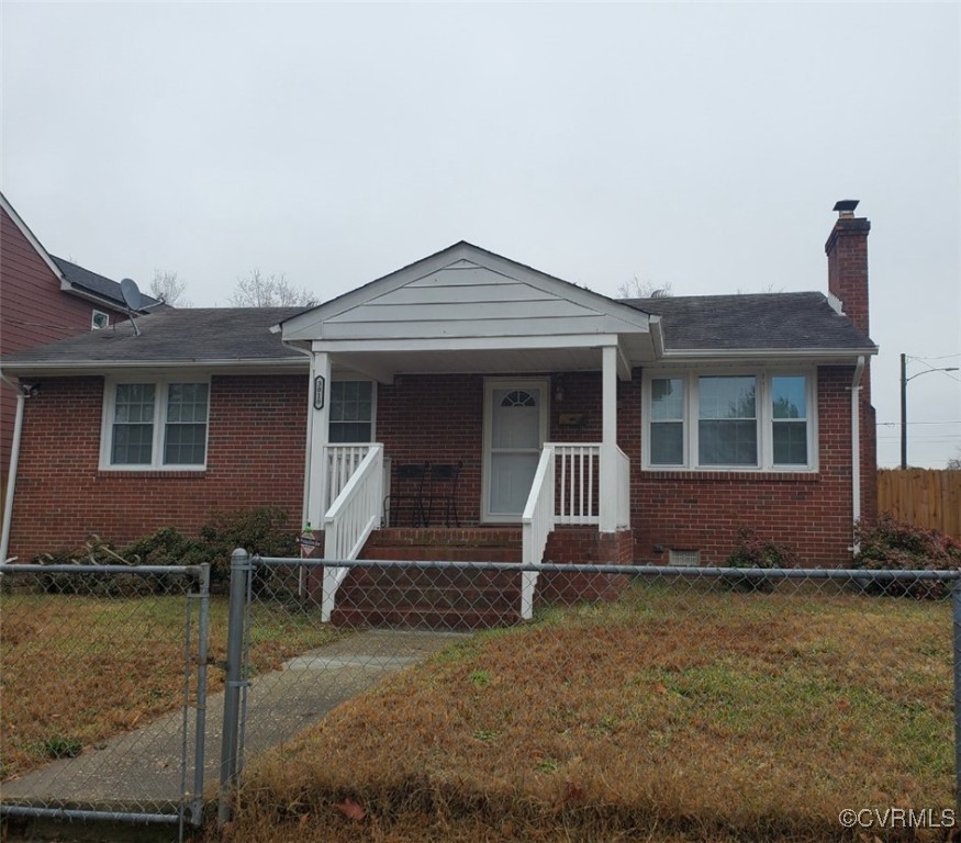 View of front of home featuring covered porch and