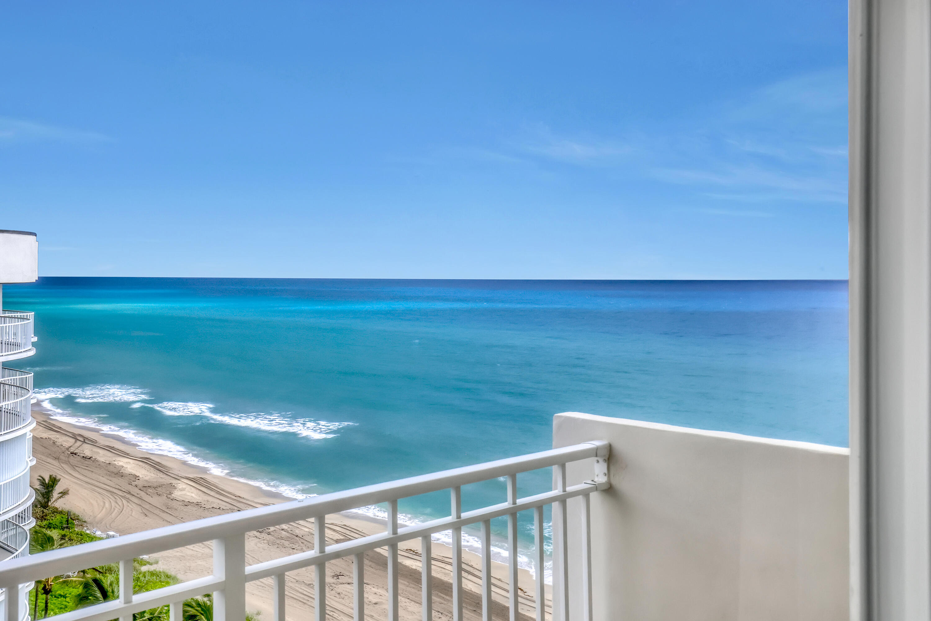 a view of an ocean from a balcony