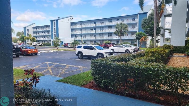 a cars parked in front of a building