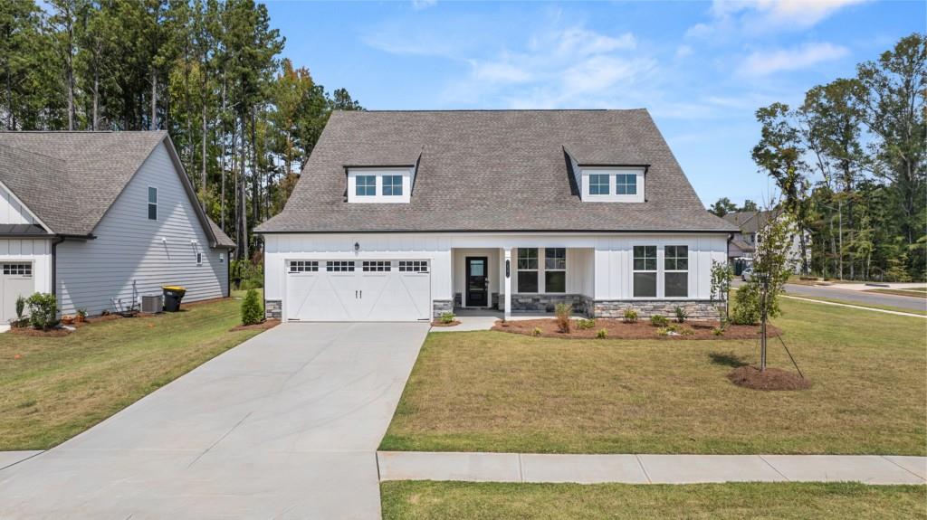 front view of a house with a yard