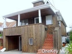 a front view of a house with a garage